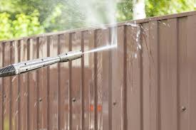 Soak your brush in your cleaning solution, and scrub any areas that show staining. Cost To Pressure Wash Fence Pressure Wash Wood Fence
