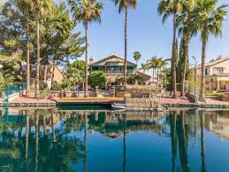 waterfront homes in val vista lakes