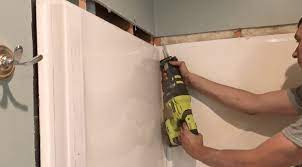 safely remove a fiberglass shower from