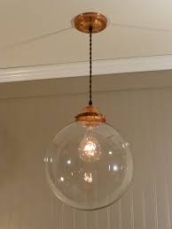 Copper Pendant Light With A 12 Inch Clear Glass Globe