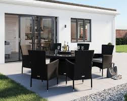 Dining tables are usually rectangular but this doesn't mean that a round table for example can't be as functional and practical as the usual ones. Black Large Round 6 Seater Rattan Garden Dining Set With Lazy Susan Cambridge Range Rattan Direct