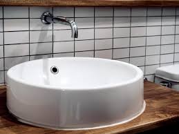 Sink Basin On Brown Wooden Plank Shelf
