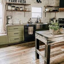 Home living blog green kitchen with black appliances. Green Kitchen Cabinet Ideas