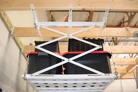 It features two overhead racks capable of holding more than 150lbs, so you can stack multiple boards on top and it'll still hold steady. The 7 Best Overhead Ceiling Racks Garage Storage Systems Garage Door Nation
