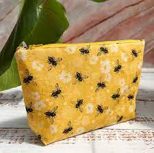 golden bees makeup bag designed by boo