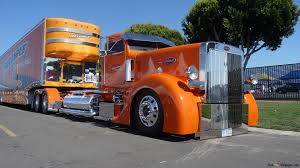 big orange peterbilt truck 4k wallpaper