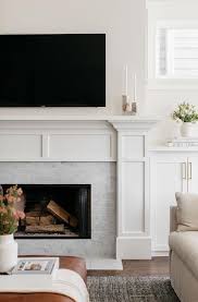 White Fireplace Mantel With Gray Marble
