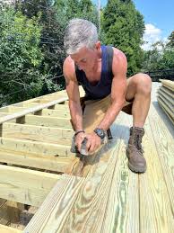 how to install deck boards crown up or