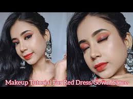 party makeup with red dress gown