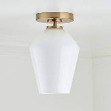 arren brass flush mount light with milk