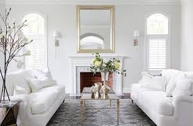 White Sofas With An Antiqued Mirrored