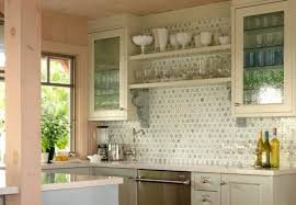 inviting kitchen with gl cabinet doors