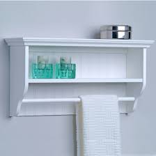 white wood bathroom shelf with towel