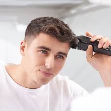 Wet your hair so it's damp and part it down the middle with your comb. How To Cut Your Own Hair Men Cutting Hair With Clippers 2021 Guide