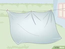 Use a mild liquid detergent without added bleach, whiteners, or fabric softeners. 6 Easy Ways To Dry Bed Sheets Without Wrinkles Wikihow