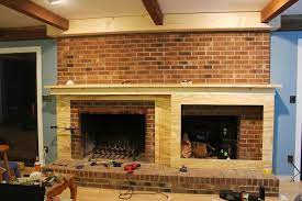 A Fireplace Facade Covering The Brick
