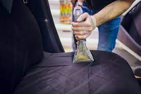 removing milk stains from car seats