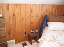 painting over knotty pine paneling