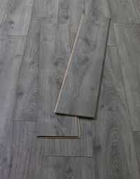 Wonderful home design ideas the timeless oak grey laminate floor has a refined appearance that blends a realistic wood effect design with an elegant neutral tone to offer the best of both worlds. Loft Midnight Grey Laminate Flooring Direct Wood Flooring