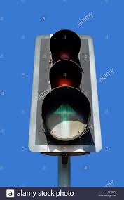 Traffic Lights On Green Arrow Move Ahead Only Stock Photo