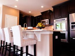 modern kitchen with dark wood cabinets