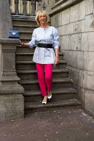 A Pair Of Bright Pink Trousers Worn