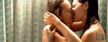 Lesbians kissing in shower