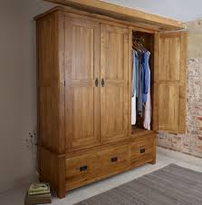 Many of our wardrobes include interior fittings such clothes rails and shelves to help you organize your stuff. Original Rustic Solid Oak Triple Armoire Oak Wardrobe Oak Furniture Land Wood Wardrobe
