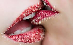 women kissing with salted lips