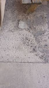 cement sidewalk crumbling sidewalk