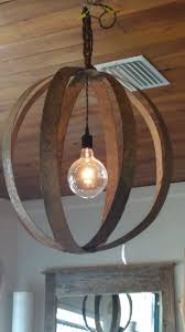 Whisky Barrel Rings Re Purposed Into A Light Wine Barrel Rings Barrel Decor Wine Barrel Furniture