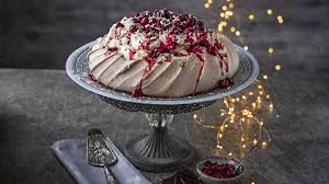 Pavlova, unlike other meringues, is crisp on the outside, but still has chew on the inside. Three Showstopper Chocolate Desserts For Christmas