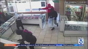 smash and grab robbers storm l a