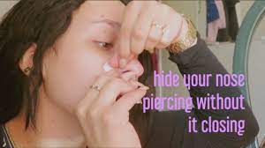 how to hide nose piercing you