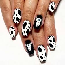 cow print nails that add a playful aura