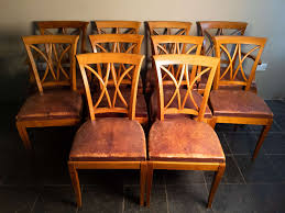 a set of 10 fruitwood dining chairs in