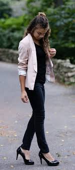 stylishly wear a light pink blazer