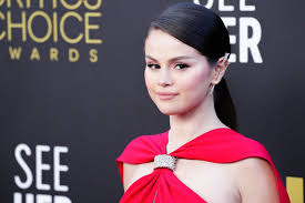 selena gomez wears red cape dress at