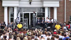 Image result for lebron james in front of promise school