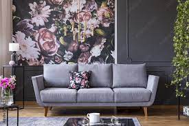 grey lounge with patterned cushion in