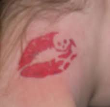 red lips tattoo on neck