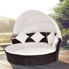 white and brown wicker round outdoor