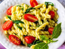 gemelli pesto pasta with tomatoes and