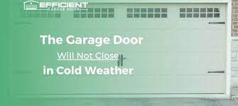 the garage door will not close in cold