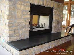 Fireplace With Stone Veneer And Black