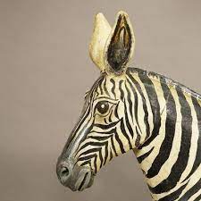 Wooden Carved Statue Of A Zebra Hand