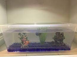 It is 8 inches high with a diameter of 10 inches and includes planting stones made from ceramic substrates. Dollar Store Fish Tank How To Make A Complete Betta Aquarium For Less Than 15 Youtube Plastic Fish Tank Betta Aquarium Diy Fish Tank