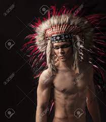 Naked Indian Strong Man With Traditional Native American Make Up And  Headdress Looking At The Side. Close Up Studio Shot Stock Photo, Picture  and Royalty Free Image. Image 34026266.
