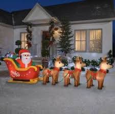 Includes snowshoes, a flask and basket on his back. Home Accents Holiday Santa Sleigh Yarddecor