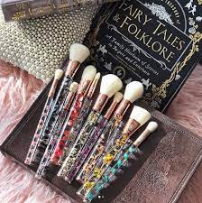 makeup brushes with real flowers in